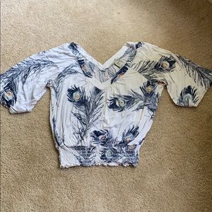 White and peacock print v neck blouse